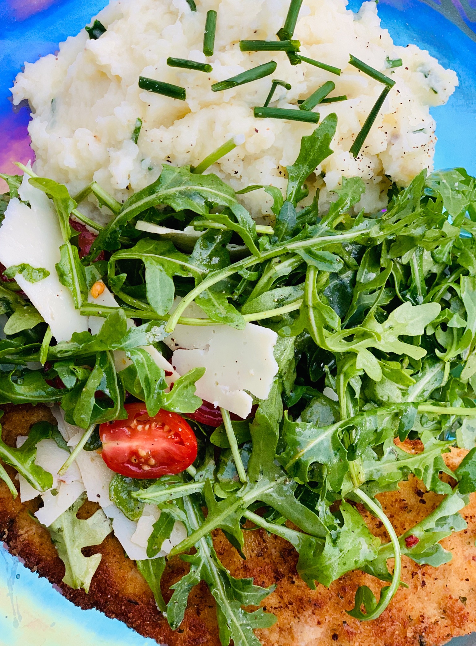 Parmesan crusted chicken with lemon vinaigrette baby arugula salad and mashed potatoes with chives